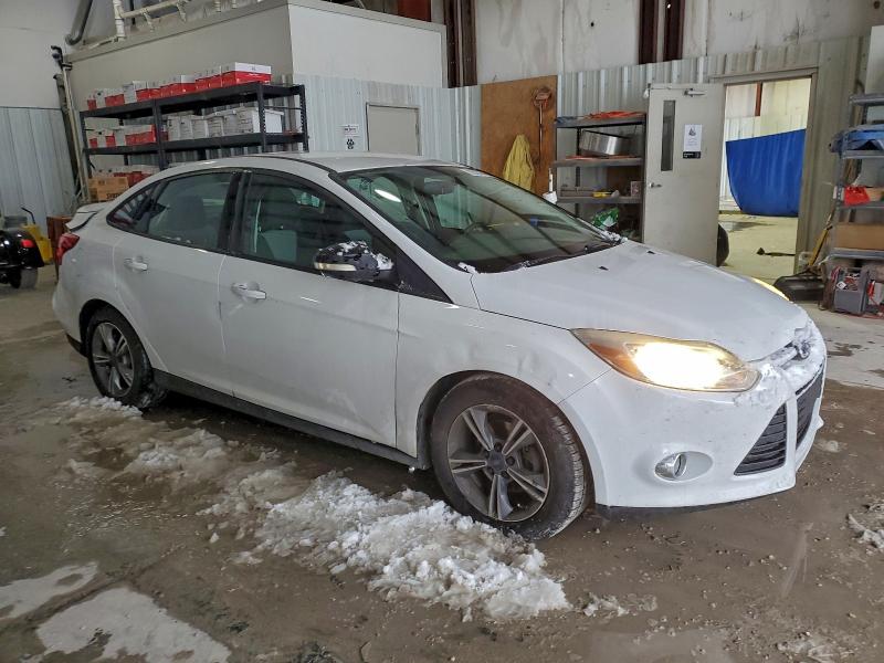 Foto 4 de la subasta – 2014 FORD FOCUS SE con VIN 1FADP3F27EL371112