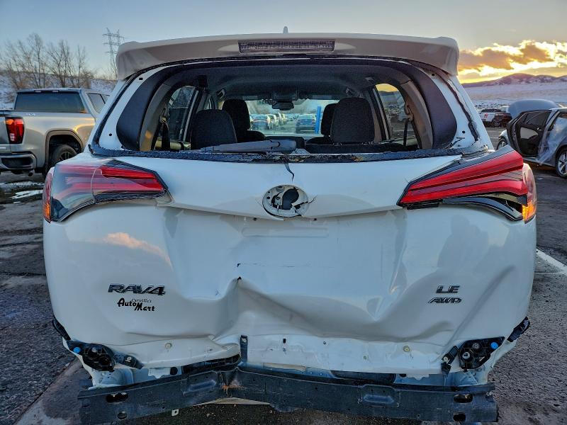 Photo 6 from auction – 2018 TOYOTA RAV4 LE with VIN 2T3BFREV8JW752882