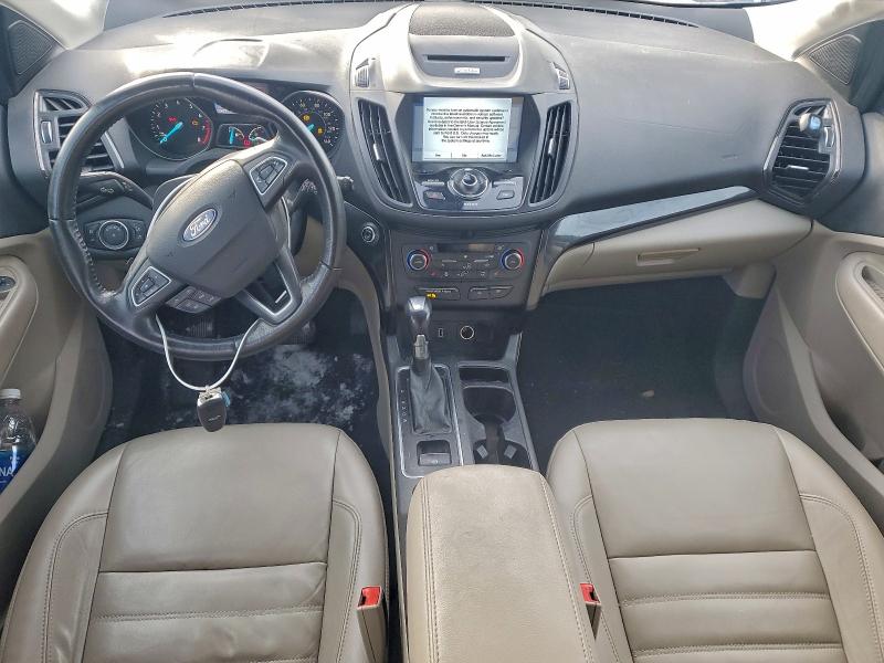 Photo 8 from auction – 2017 FORD ESCAPE TIT with VIN 1FMCU9J92HUC56336