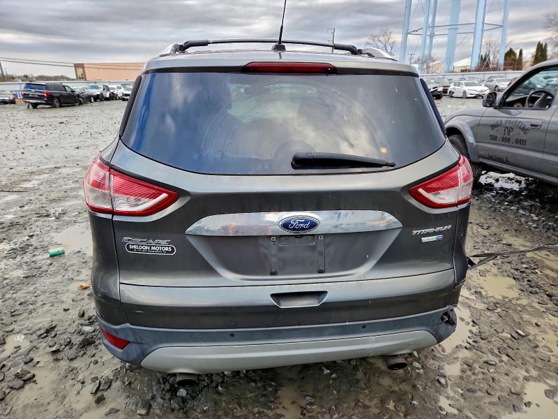 Photo 6 from auction – 2015 FORD ESCAPE TIT with VIN 1FMCU9J95FUA13777