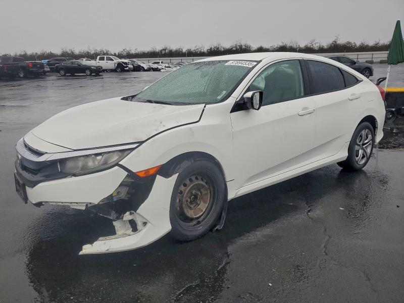 HONDA CIVIC LX 2017 with VIN 19XFC2F54HE206344 - Photo from auction