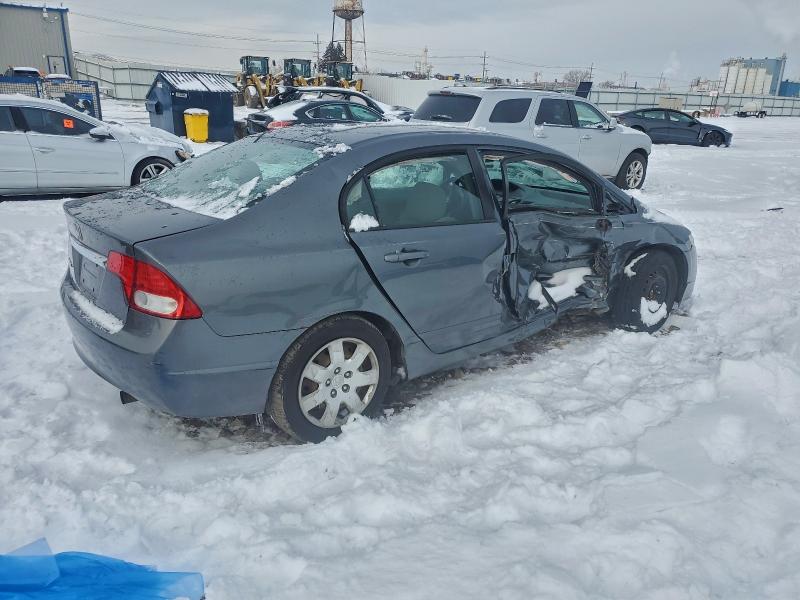 Photo 3 from auction – 2011 HONDA CIVIC LX with VIN 19XFA1F55BE026118