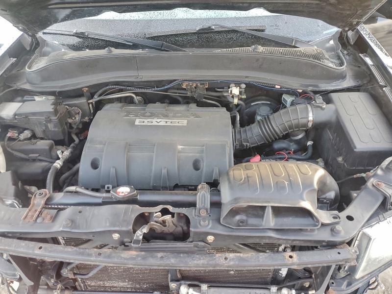 Photo 11 from auction – 2012 HONDA RIDGELINE with VIN 5FPYK1F71CB552014