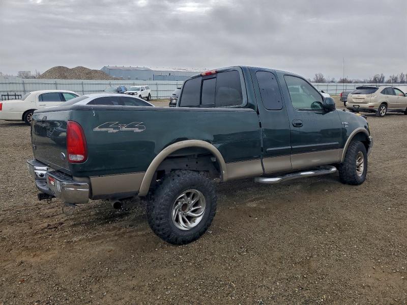 Photo 3 from auction – 2002 FORD F150 with VIN 1FTRX18L02NB54673