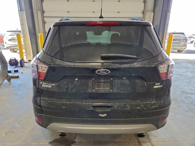Photo 6 from auction – 2018 FORD ESCAPE SE with VIN 1FMCU9GD6JUD20671
