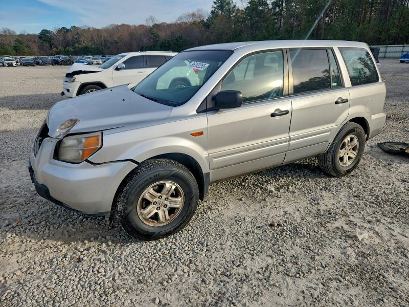 HONDA PILOT LX 2007 with VIN 5FNYF281X7B009892 - Photo from auction