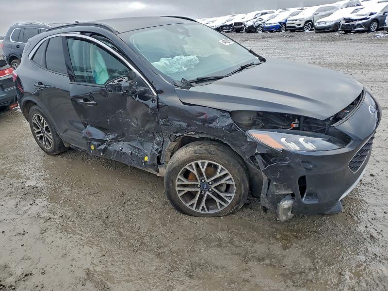 Photo 4 from auction – 2020 FORD ESCAPE SEL with VIN 1FMCU9H69LUB64001