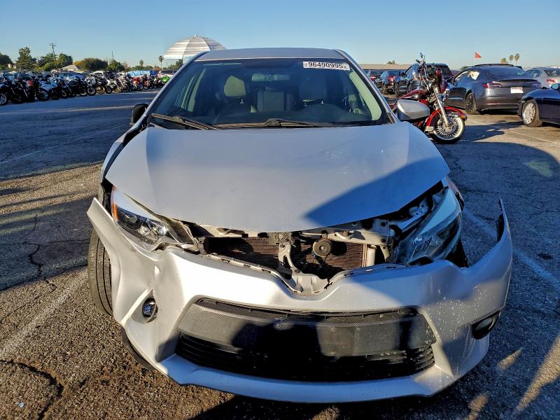 Photo 5 from auction – 2014 TOYOTA COROLLA L with VIN 5YFBURHE0EP029951