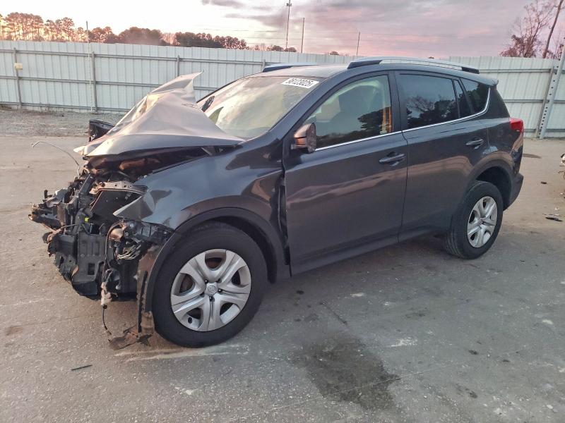 TOYOTA RAV4 LE 2014 with VIN JTMBFREV3ED081821 - Photo from auction