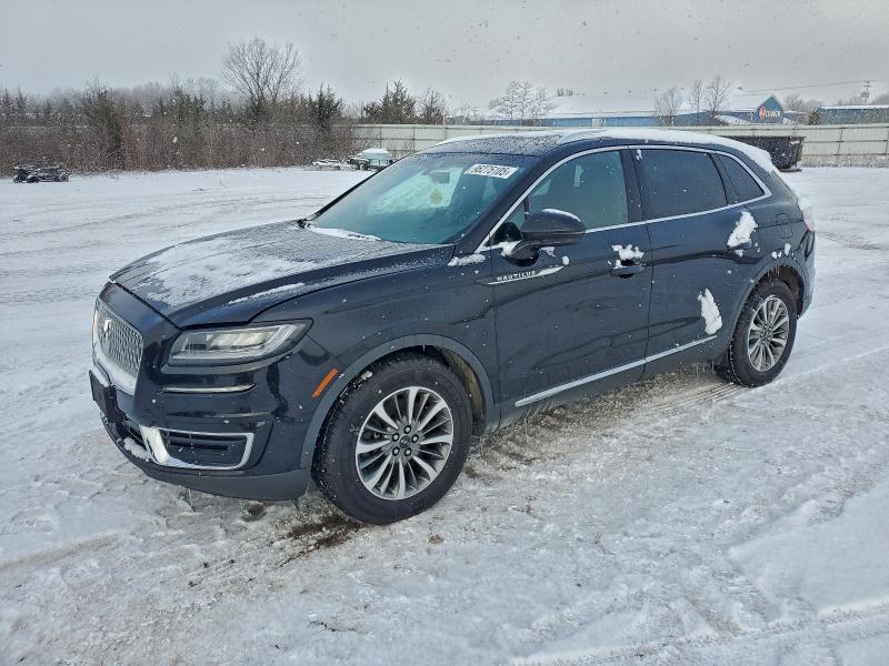 LINCOLN NAUTILUS 2020 with VIN 2LMPJ8J90LBL01054 - Photo from auction