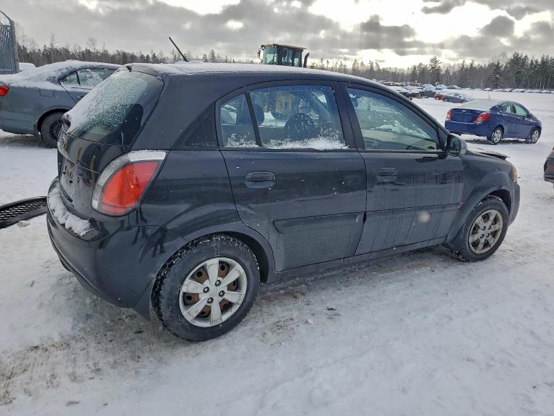 Photo 3 from auction – 2011 KIA RIO BASE with VIN KNADH5B35B6838598