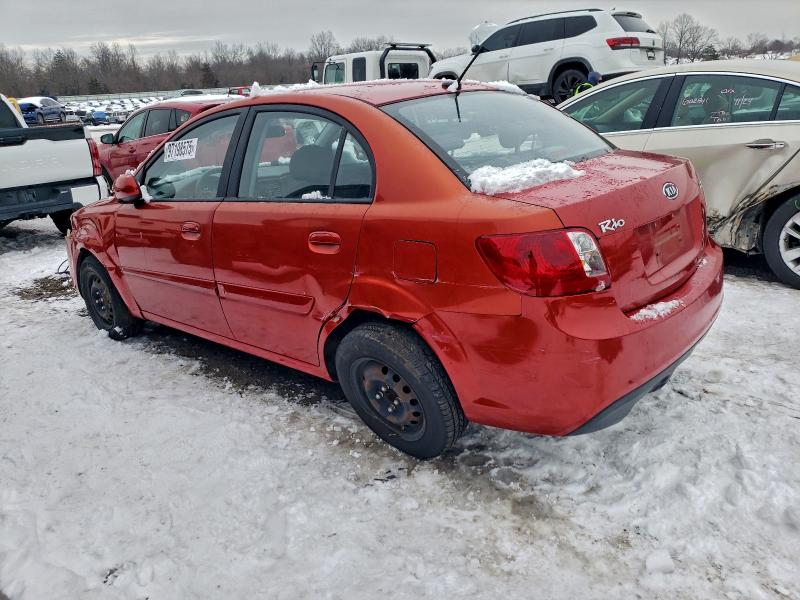 Photo 2 from auction – 2011 KIA RIO BASE with VIN KNADH4A38B6753458