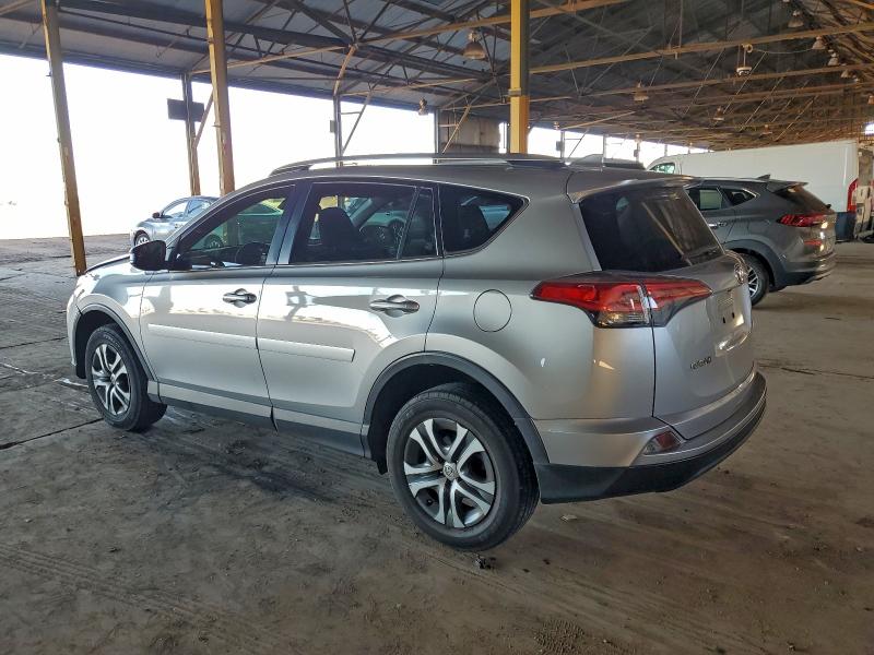 Photo 2 from auction – 2018 TOYOTA RAV4 LE with VIN JTMZFREV2JJ211565