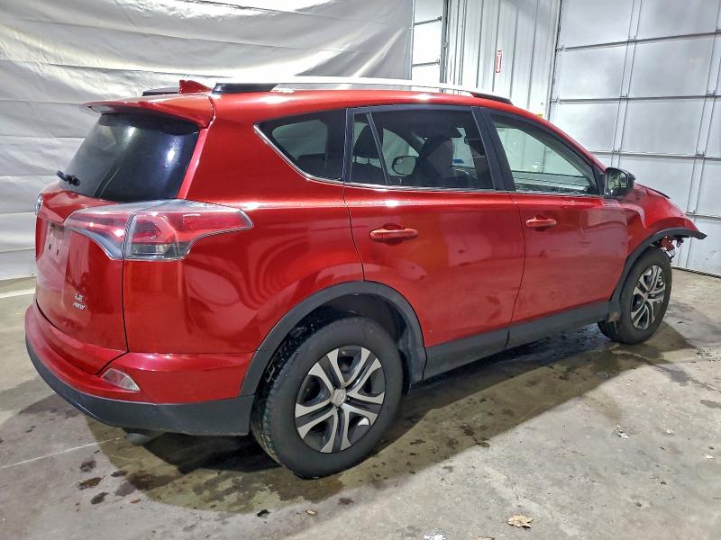 Photo 3 from auction – 2016 TOYOTA RAV4 LE with VIN JTMBFREV8GJ098151