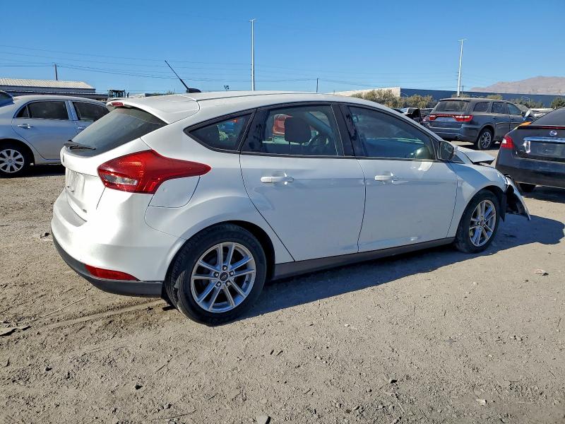 Photo 3 from auction – 2016 FORD FOCUS with VIN 1FADP3K29GL364297