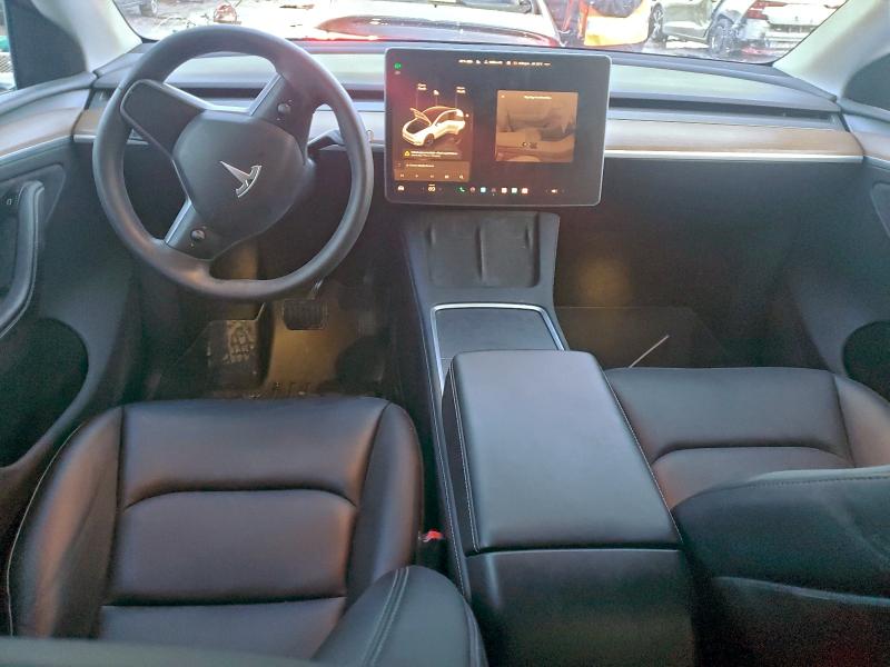 Photo 8 from auction – 2023 TESLA MODEL Y with VIN 7SAYGDEE7PA129889