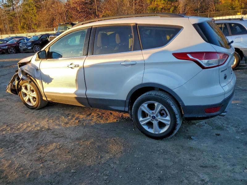 Photo 2 from auction – 2014 FORD ESCAPE SE with VIN 1FMCU0GX7EUC90284