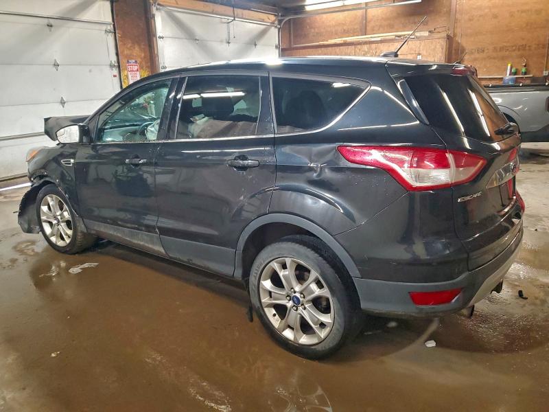 Photo 2 from auction – 2013 FORD ESCAPE with VIN 1FMCU9H98DUD25286
