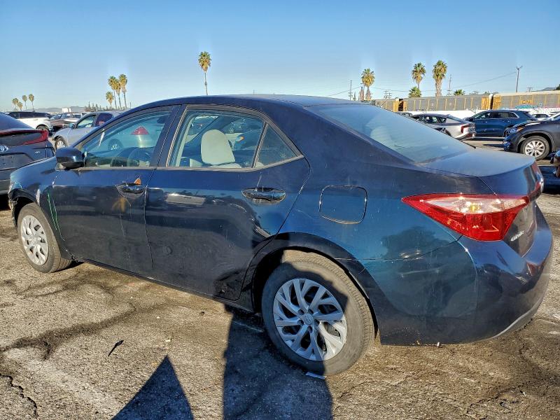 Photo 2 from auction – 2017 TOYOTA COROLLA L with VIN 5YFBURHE2HP711041