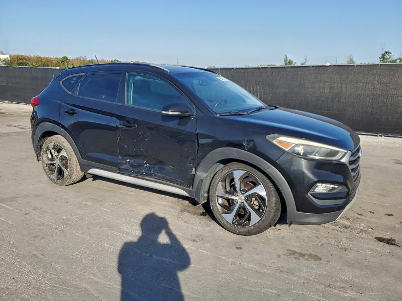 Photo 4 from auction – 2017 HYUNDAI TUCSON with VIN KM8J33A21HU575317
