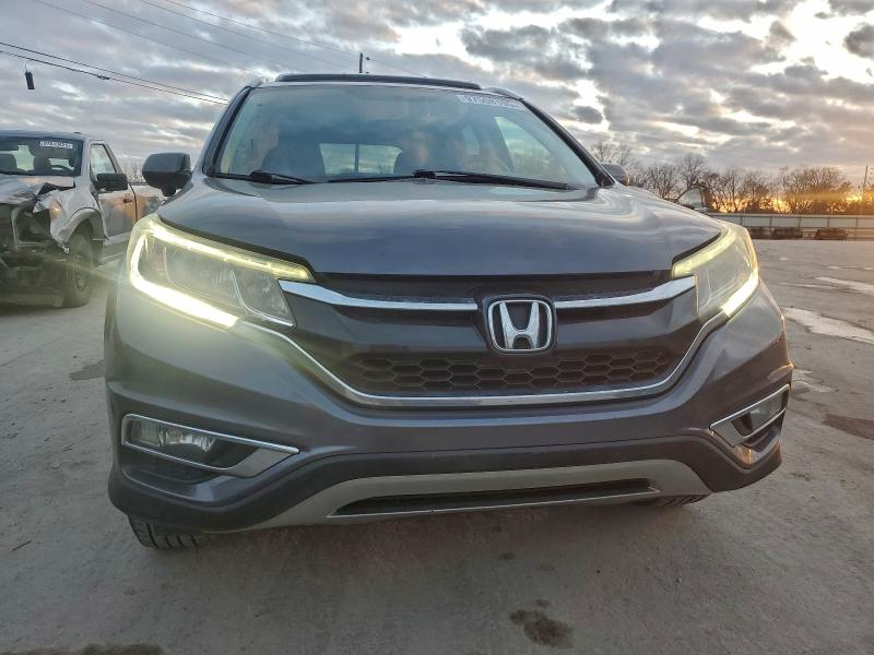 Photo 5 from auction – 2016 HONDA CR-V with VIN 2HKRM3H75GH520111