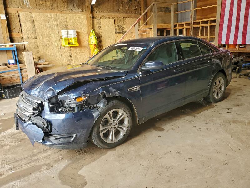 FORD TAURUS SEL 2016 with VIN 1FAHP2E85GG121977 - Photo from auction