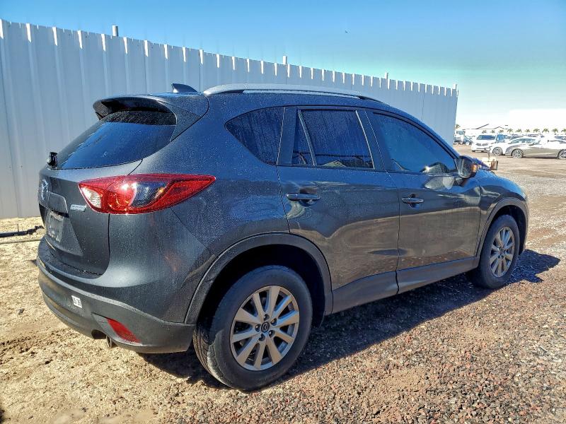 Photo 3 from auction – 2014 MAZDA CX-5 with VIN JM3KE2CY4E0414386