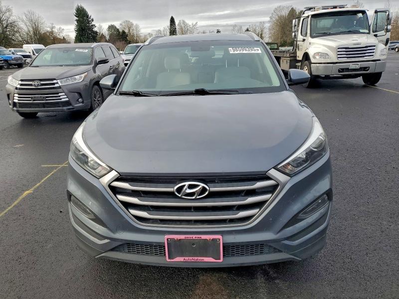 Photo 5 from auction – 2018 HYUNDAI TUCSON SEL with VIN KM8J3CA43JU670307