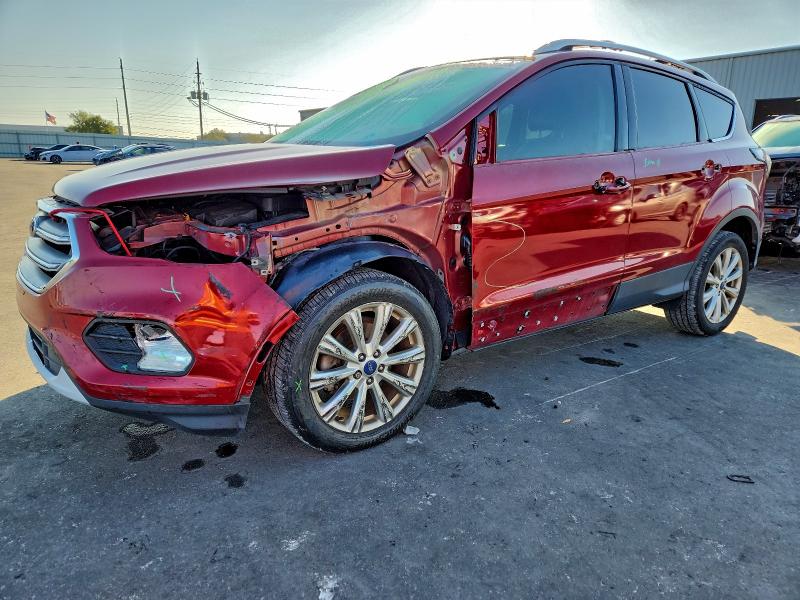 FORD ESCAPE TIT 2017 with VIN 1FMCU0JD9HUE65170 - Photo from auction