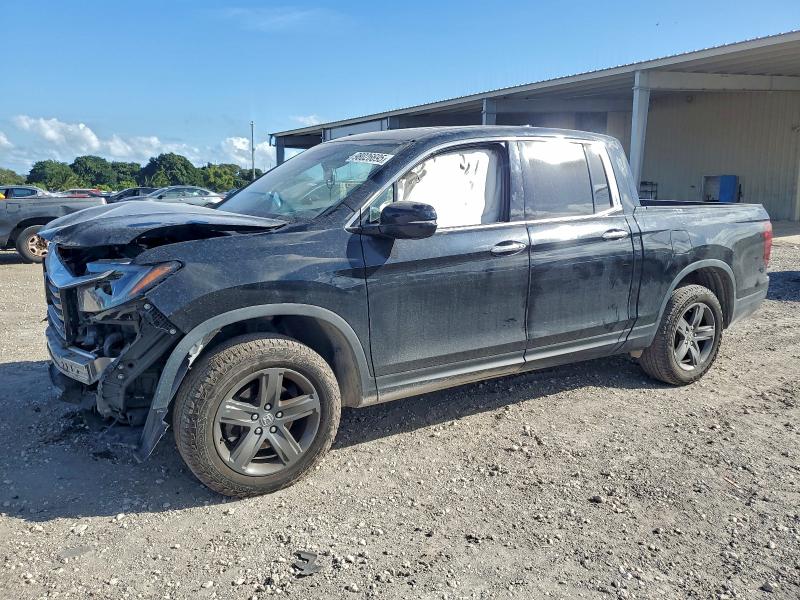 Photo 1 from auction – 2021 HONDA RIDGELINE with VIN 5FPYK3F73MB026755