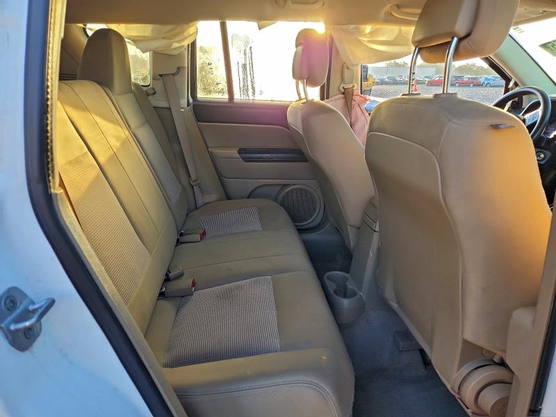 Photo 10 from auction – 2014 JEEP COMPASS SP with VIN 1C4NJCBA5ED524044
