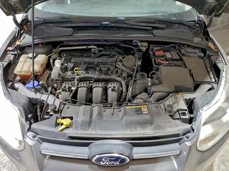 Photo 11 from auction – 2012 FORD FOCUS S with VIN 1FAHP3E23CL404493