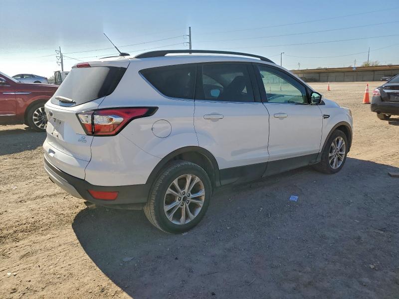 Photo 3 from auction – 2018 FORD ESCAPE with VIN 1FMCU0GD6JUD23422