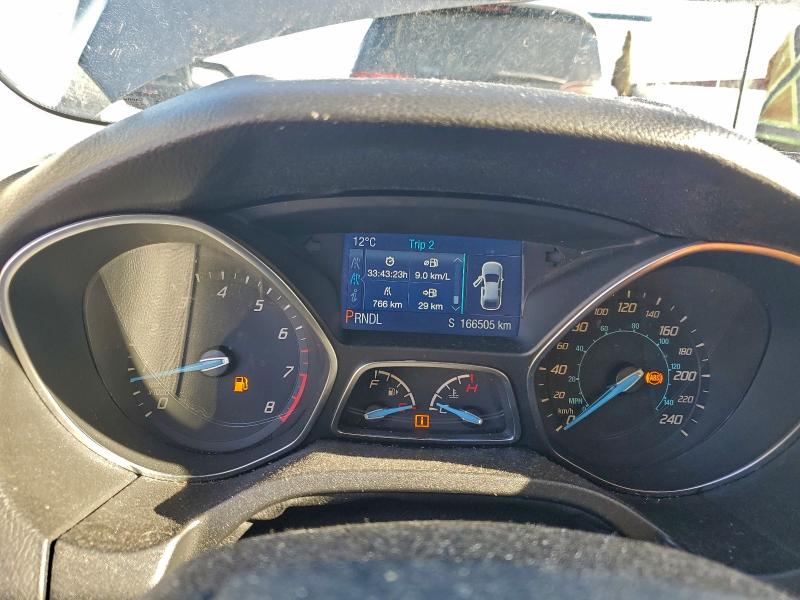 Photo 9 from auction – 2014 FORD FOCUS SE with VIN 1FADP3F24EL278872