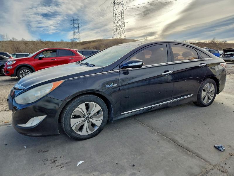 HYUNDAI SONATA HYB 2014 with VIN KMHEC4A48EA107557 - Photo from auction