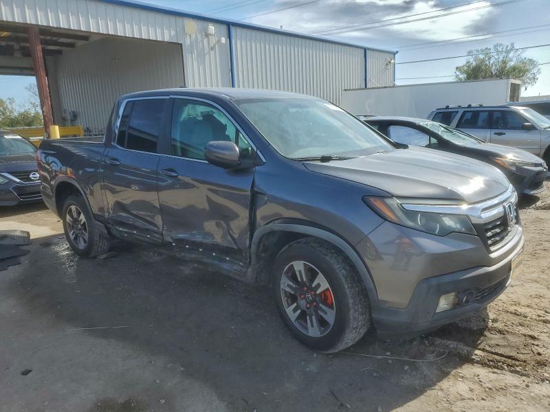 Photo 4 from auction – 2017 HONDA RIDGELINE with VIN 5FPYK3F57HB023037