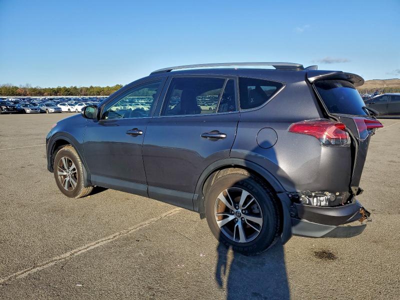 Photo 2 from auction – 2016 TOYOTA RAV4 XLE with VIN JTMRFREV4GJ065775