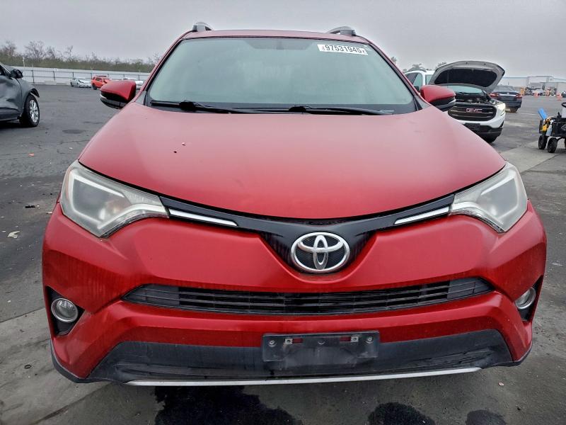 Photo 5 from auction – 2016 TOYOTA RAV4 XLE with VIN 2T3RFREV9GW500873