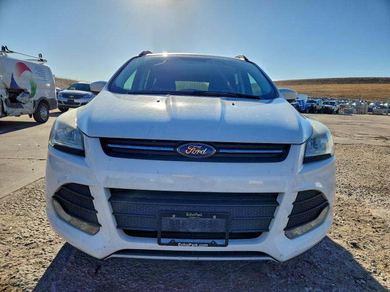 Photo 5 from auction – 2015 FORD ESCAPE SE with VIN 1FMCU9GX4FUB55124