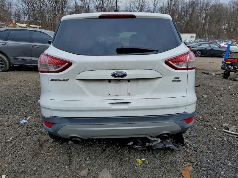 Photo 6 from auction – 2015 FORD ESCAPE SE with VIN 1FMCU9G96FUA81285