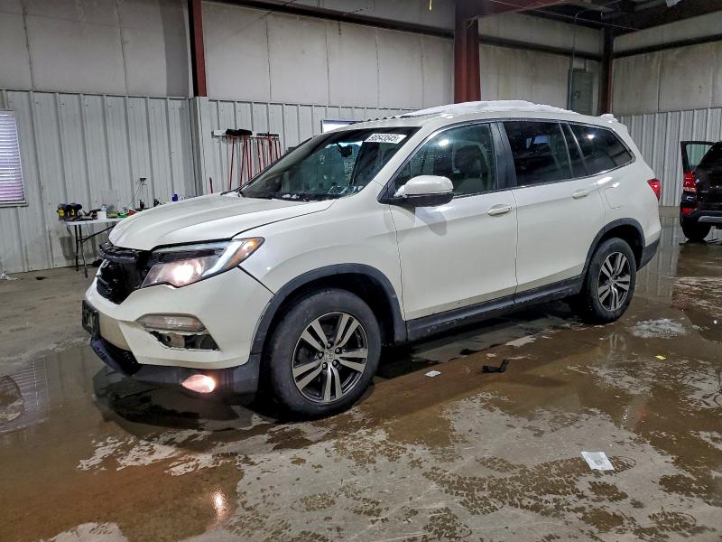 HONDA PILOT EXL 2016 with VIN 5FNYF6H52GB080370 - Photo from auction