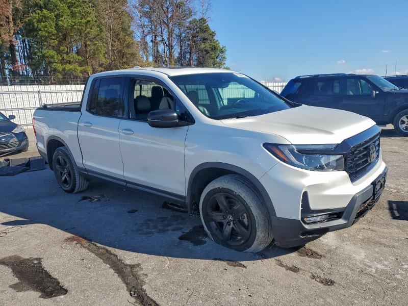 Photo 4 from auction – 2021 HONDA RIDGELINE with VIN 5FPYK3F82MB006733