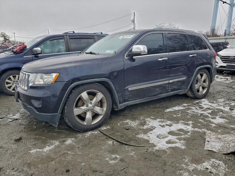 JEEP GRAND CHER 2011 with VIN 1J4RR6GT6BC605717 - Photo from auction