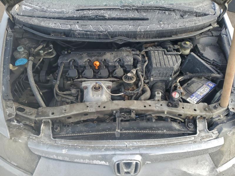 Photo 11 from auction – 2007 HONDA CIVIC DX with VIN 2HGFA16397H024562