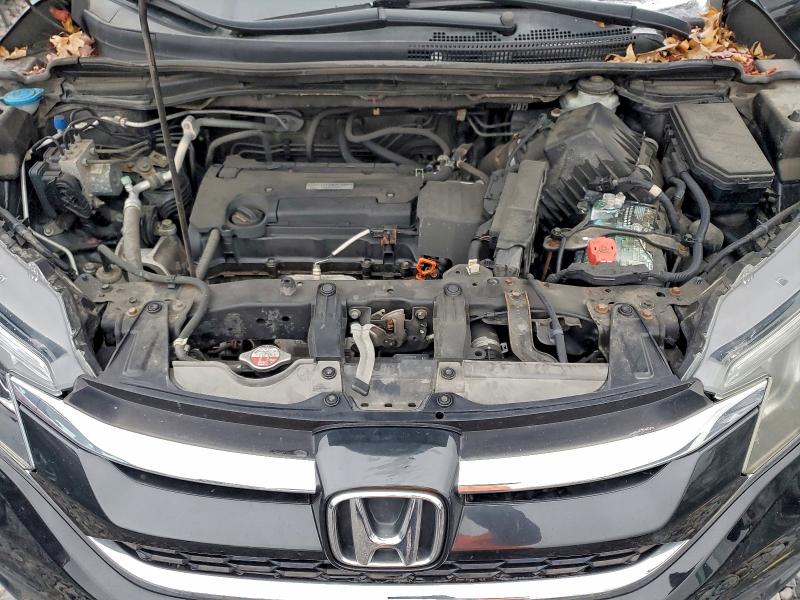 Photo 12 from auction – 2016 HONDA CR-V with VIN 2HKRM4H31GH697239