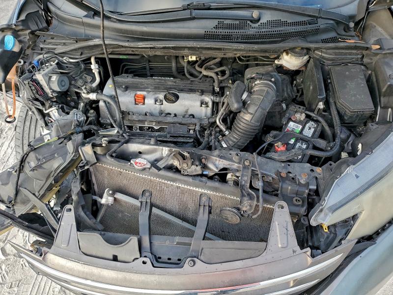 Photo 12 from auction – 2014 HONDA CR-V LX with VIN 3CZRM3H38EG714838