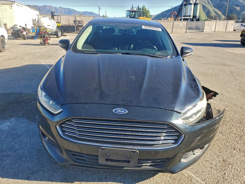 Photo 5 from auction – 2014 FORD FUSION SE with VIN 3FA6P0HD5ER283876