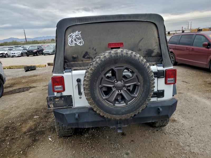 Photo 6 from auction – 2015 JEEP WRANGLER U with VIN 1C4BJWDG2FL611154