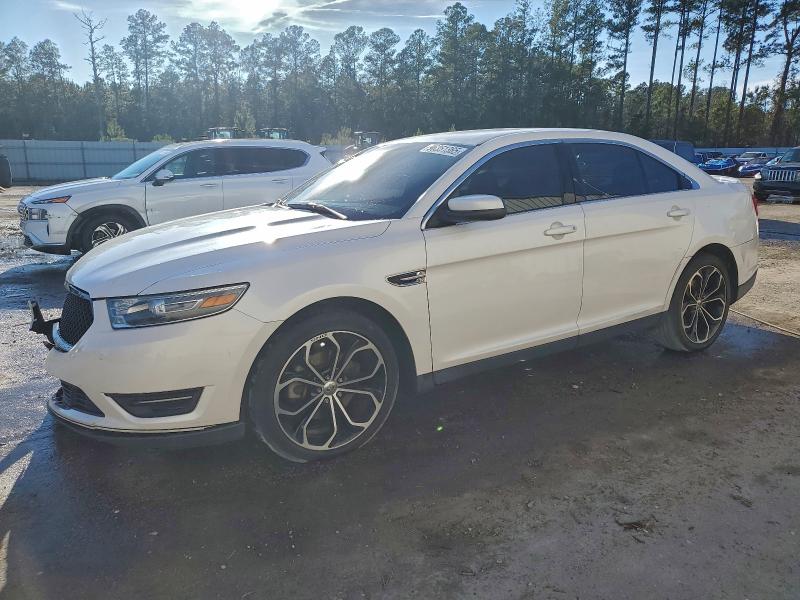 FORD TAURUS SEL 2014 with VIN 1FAHP2E81EG132858 - Photo from auction