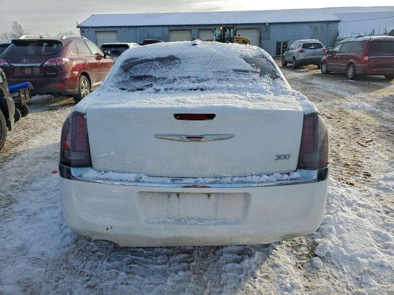 Photo 6 from auction – 2014 CHRYSLER 300 with VIN 2C3CCAAGXEH216418